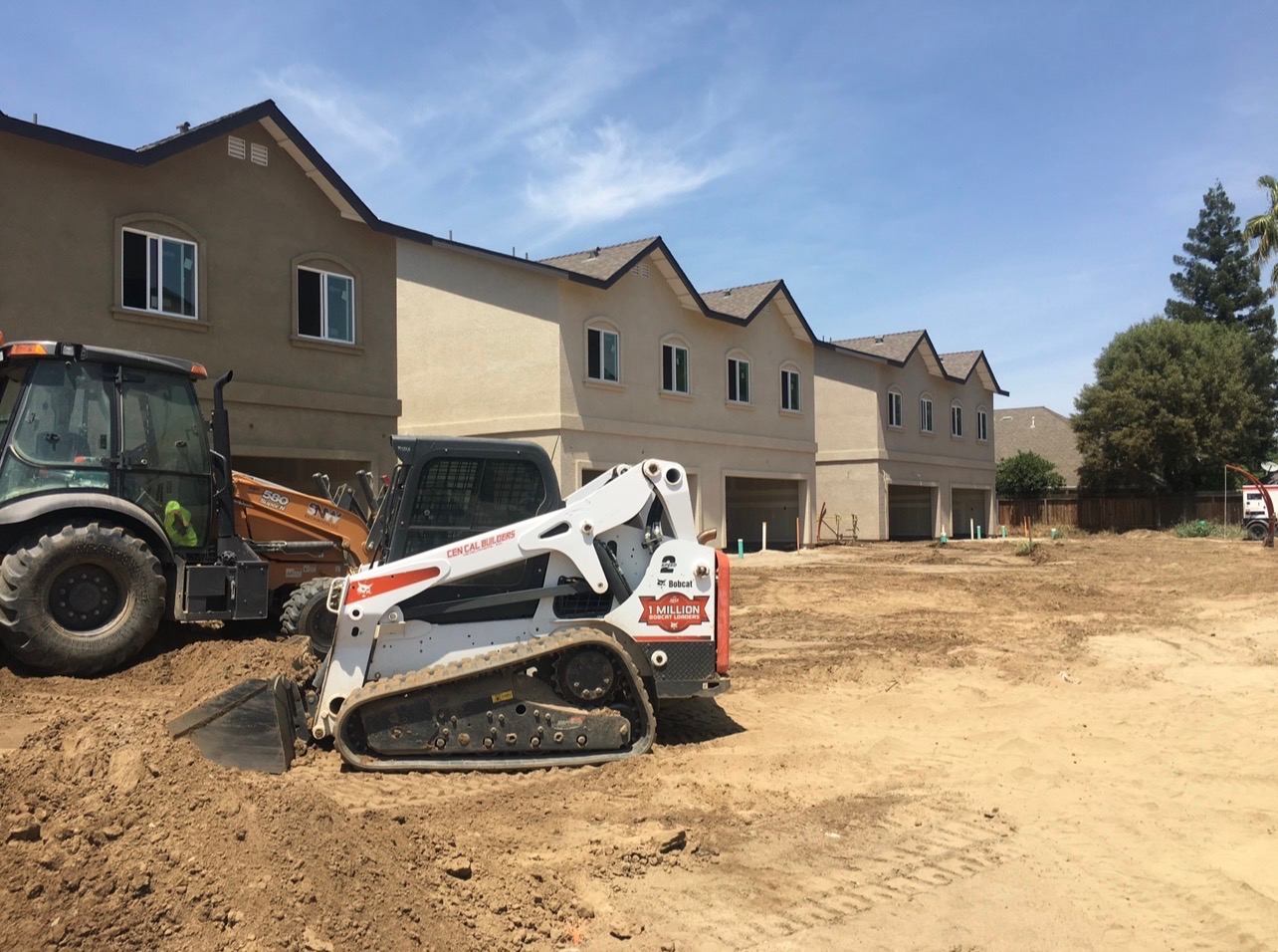 Clovis townhouses and grading equipment during construction