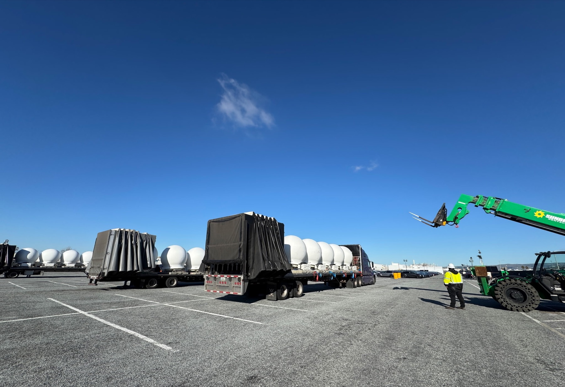 SpaceX Starlink data center modules staged with transport and lifting equipment